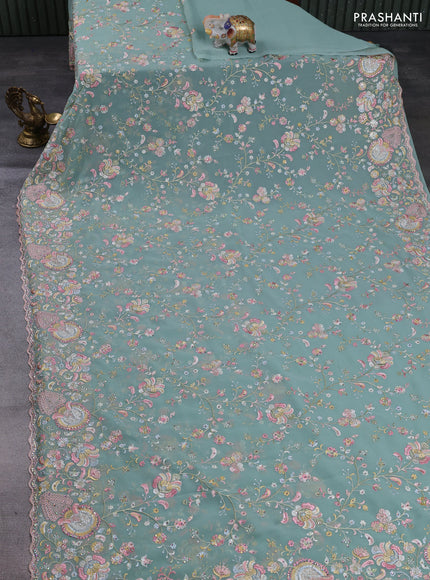 Georgette saree pastel green with allover embroidery & stone work