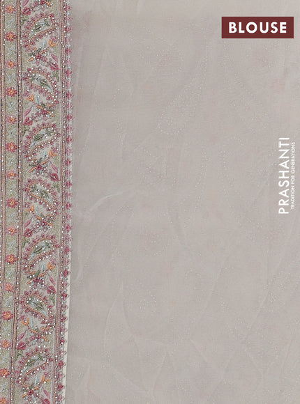 Georgette saree cream with allover embroidery & stone work