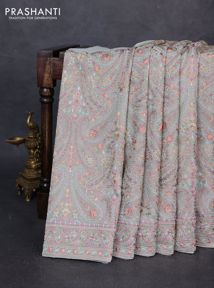 Georgette saree pastel green with allover embroidery & stone work