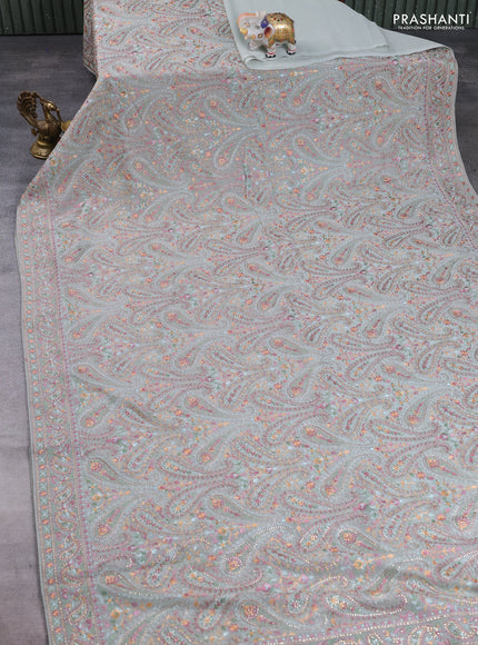 Georgette saree pastel green with allover embroidery & stone work