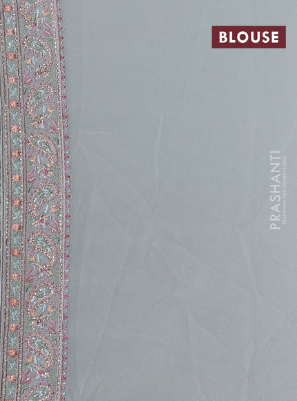 Georgette saree pastel green with allover embroidery & stone work