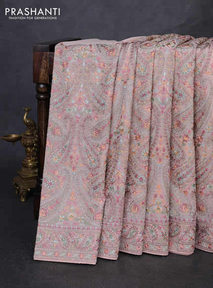 Georgette saree pastel peach with allover embroidery & stone work