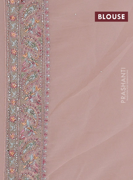 Georgette saree pastel peach with allover embroidery & stone work