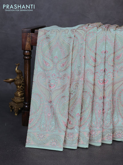 Georgette saree pista green with allover embroidery & stone work