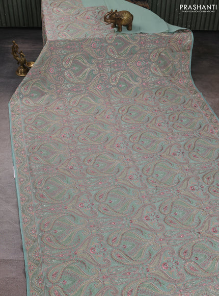 Georgette saree pastel green with allover embroidery & stone work