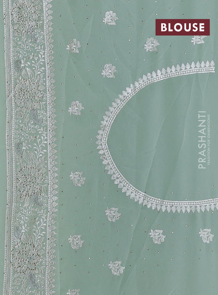 Georgette saree mild pista green with allover embroidery & stone work