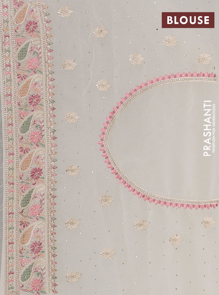 Georgette saree off white with allover embroidery buttas & stone work and embroidery & stone work border