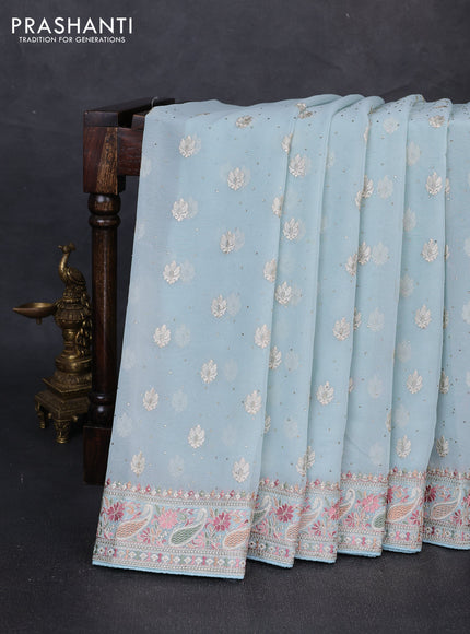 Georgette saree pastel blue with allover embroidery buttas & stone work and embroidery & stone work border