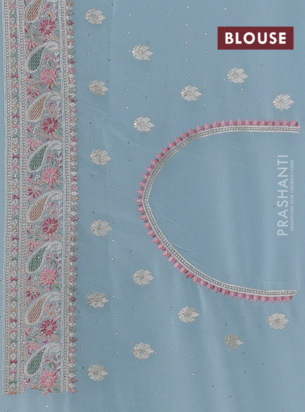Georgette saree pastel blue with allover embroidery buttas & stone work and embroidery & stone work border