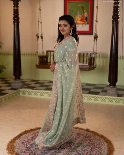 Georgette saree pastel green with allover embroidery buttas & stone work and embroidery & stone work border