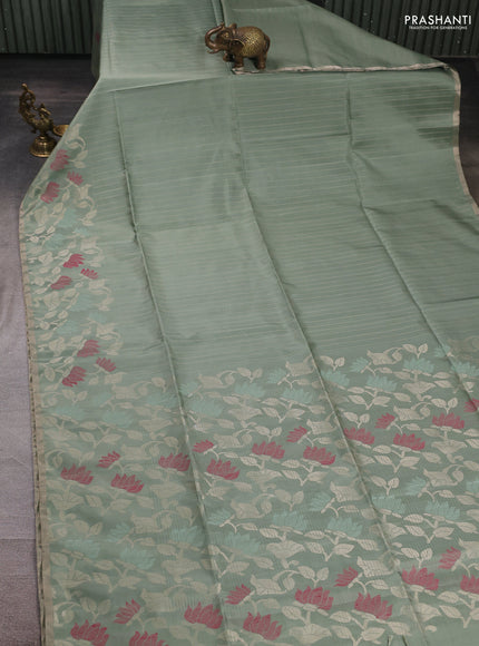 Pure soft silk saree pastel green with allover zari stripe pattern and floral zari woven border