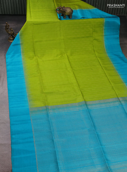 Pure soft silk saree light green and teal green shade with allover zari woven buttas and zari woven simple border