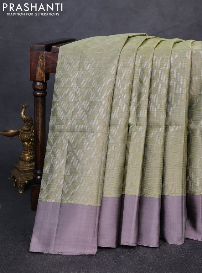Pure soft silk saree elaichi green and grey shade with allover zari woven brocade weaves and simple border
