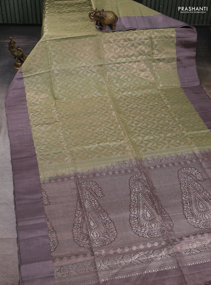 Pure soft silk saree elaichi green and grey shade with allover zari woven brocade weaves and simple border