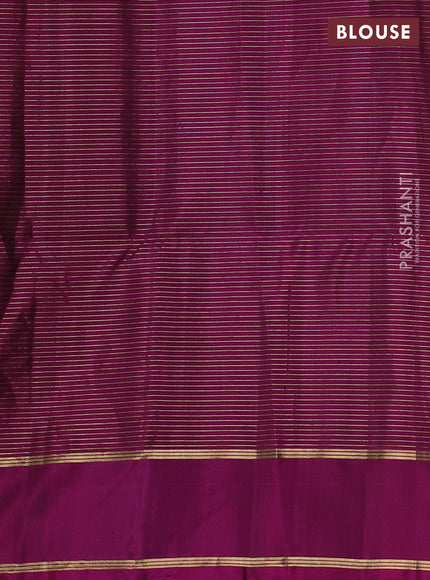 Pure soft silk saree green and purple with allover small zari checks & buttas and rettapet zari woven border