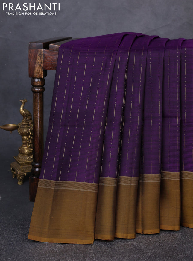 Pure soft silk saree violet and dark mustard with allover zari weaves and zari woven simple border