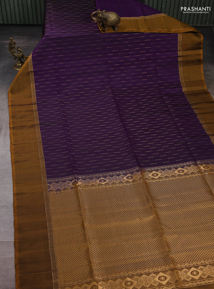 Pure soft silk saree violet and dark mustard with allover zari weaves and zari woven simple border