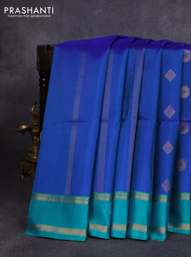 Pure soft silk saree dual shade of blue and teal green with allover zari weaves & buttas and rettapet zari woven border