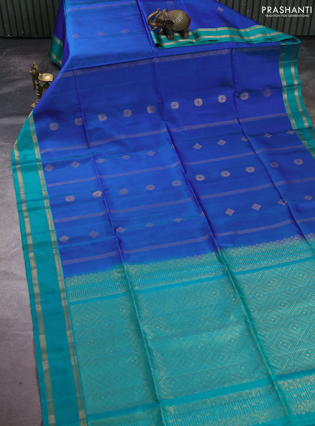 Pure soft silk saree dual shade of blue and teal green with allover zari weaves & buttas and rettapet zari woven border