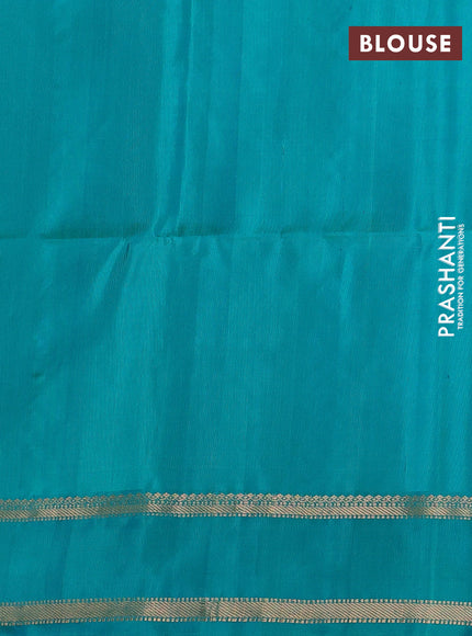 Pure soft silk saree dual shade of blue and teal green with allover zari weaves & buttas and rettapet zari woven border