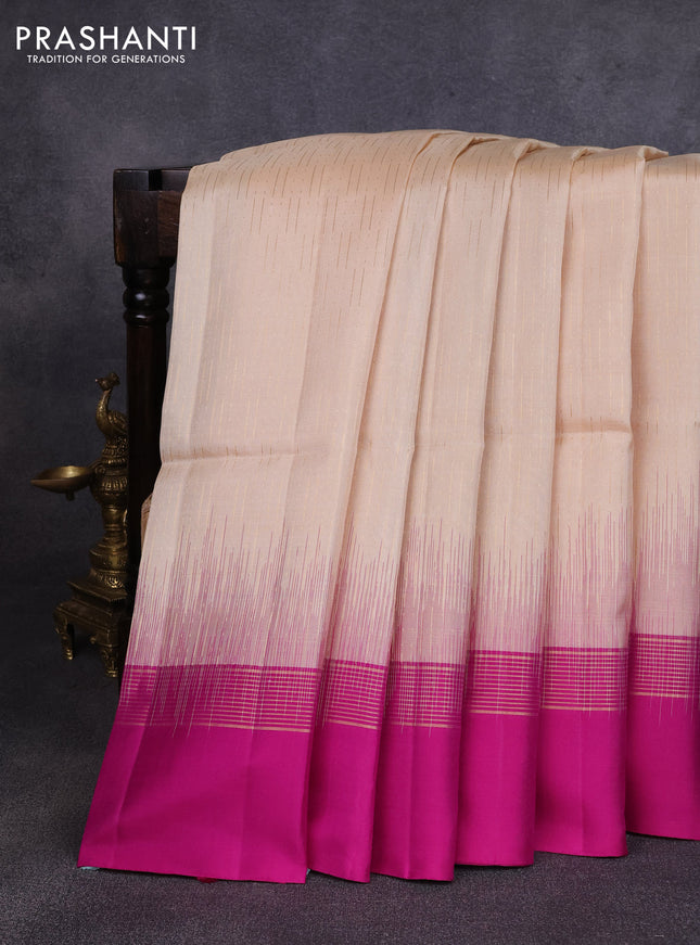 Pure soft silk saree cream and magenta pink with allover zari weaves and zari woven simple border