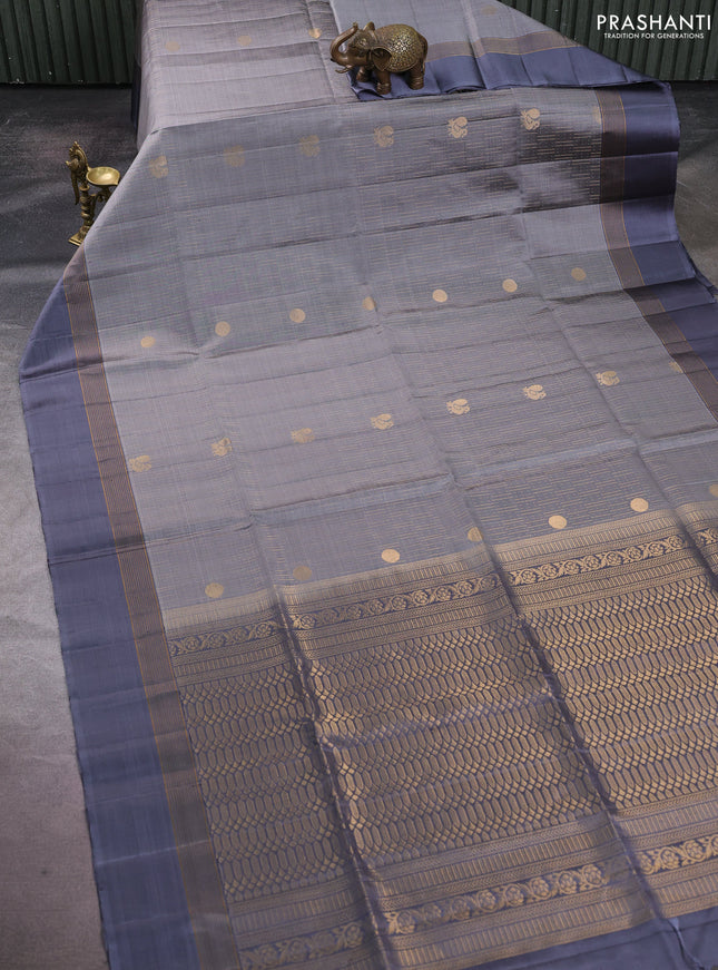 Pure soft silk saree grey with allover zari weaves and zari woven simple border