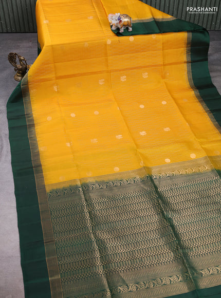 Pure soft silk saree yellow and bottle green with allover zari weaves and zari woven simple border