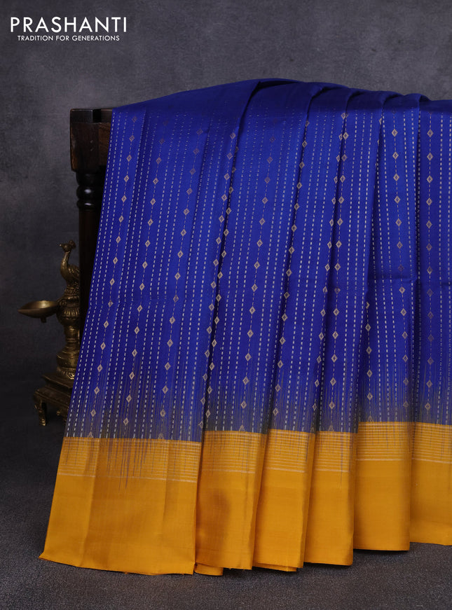 Pure soft silk saree blue and mustard yellow with allover zari weaves and zari woven simple border
