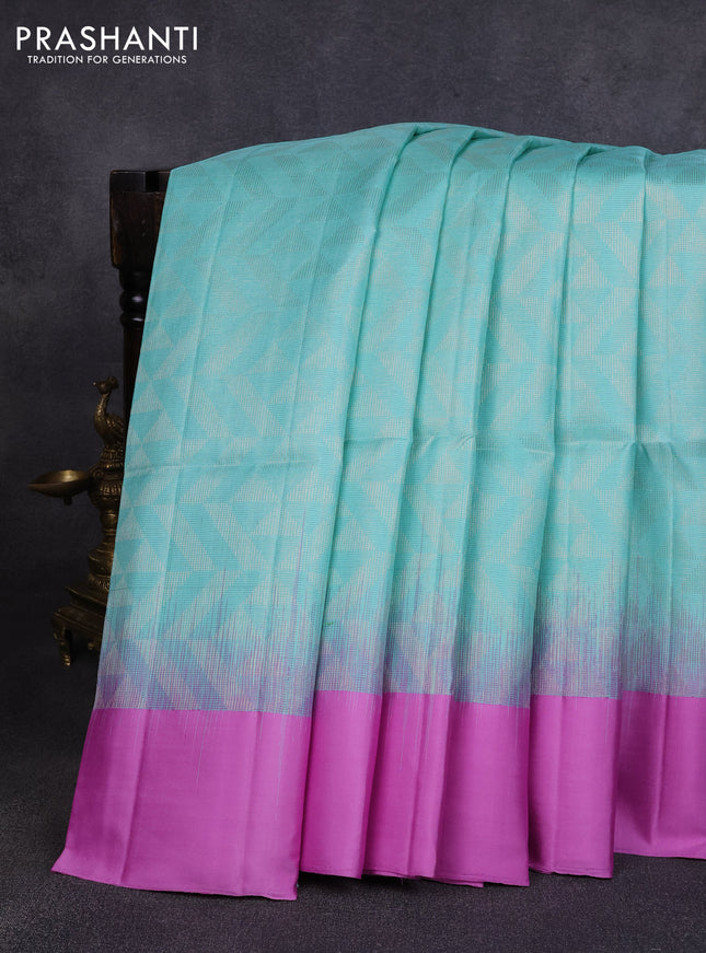 Pure soft silk saree teal blue and lavender with allover zari woven brocade weaves and simple border
