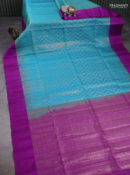 Pure soft silk saree dual shade of teal blue and purple with allover zari woven brocade weaves and simple border