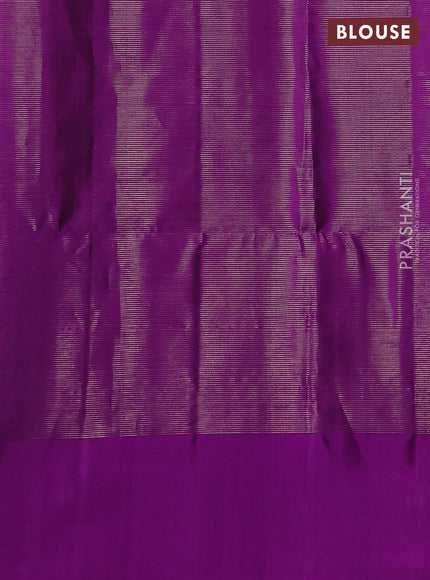 Pure soft silk saree dual shade of teal blue and purple with allover zari woven brocade weaves and simple border