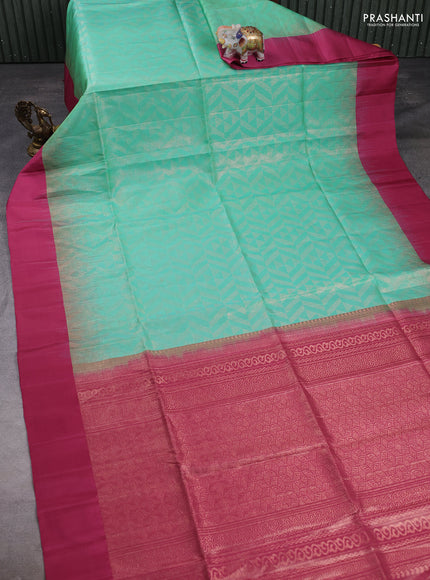 Pure soft silk saree teal green and onoion pink with allover zari woven brocade weaves and simple border