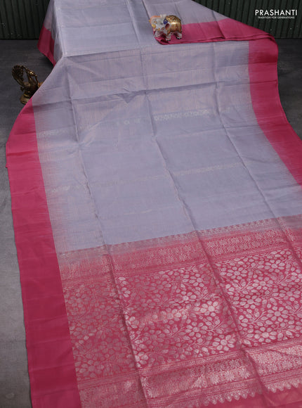 Pure soft silk saree grey and peach shade with allover zari woven brocade weaves and simple border