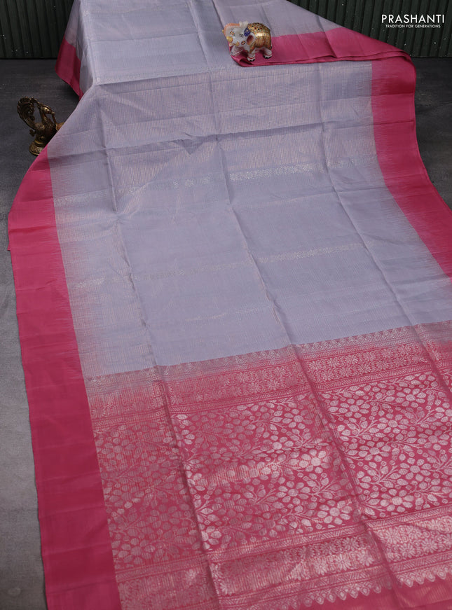 Pure soft silk saree grey and peach shade with allover zari woven brocade weaves and simple border