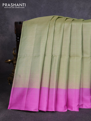 Pure soft silk saree pista green and lotus pink with allover zari woven brocade weaves and simple border