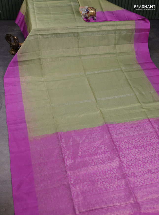 Pure soft silk saree pista green and lotus pink with allover zari woven brocade weaves and simple border
