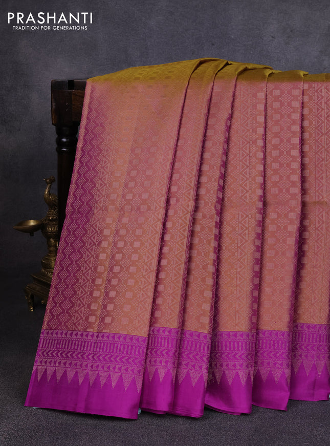 Pure soft silk saree dual shade of pastel brown and purple with allover zari woven brocade weaves and zari woven border
