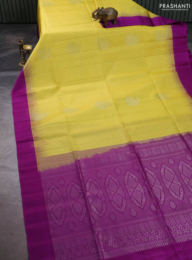 Pure soft silk saree pale yellow and purple with allover small checks & buttas and simple border