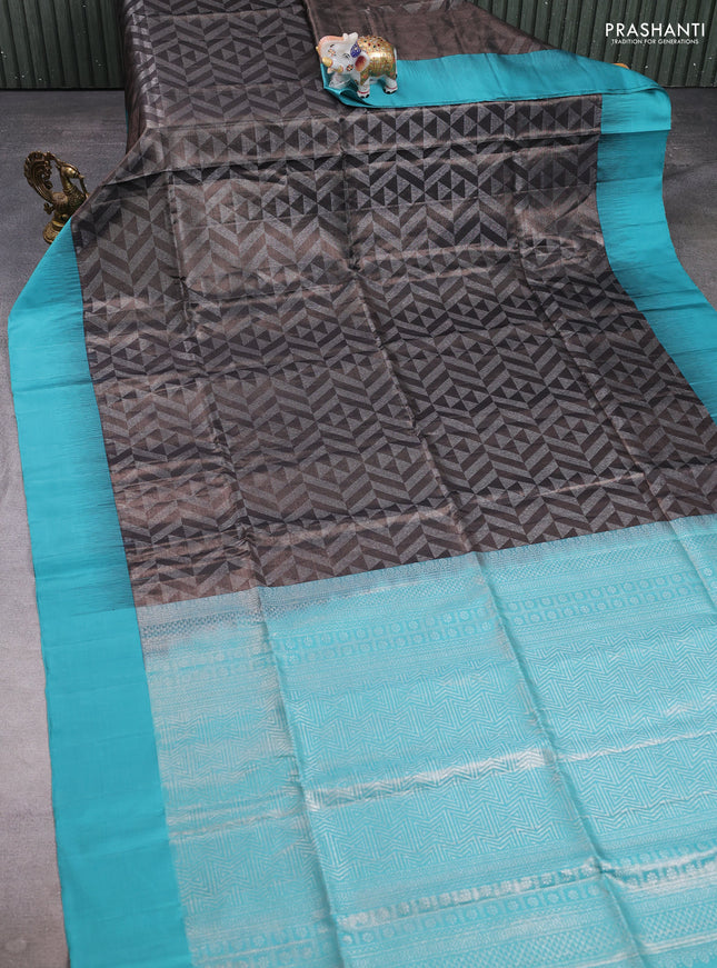 Pure soft silk saree coffee brown and teal blue with allover zari woven geometric brocade weaves and simple border