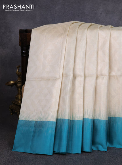 Pure soft silk saree cream and teal blue with allover zari woven brocade weaves and simple border