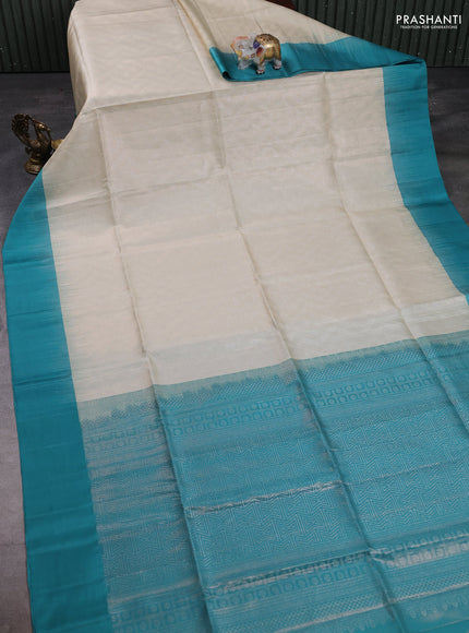 Pure soft silk saree cream and teal blue with allover zari woven brocade weaves and simple border
