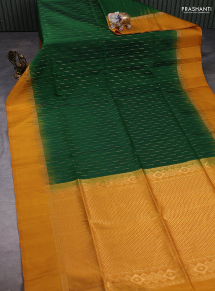 Pure soft silk saree dark green and mustard yellow with allover zari woven butta weaves and zari woven simple border