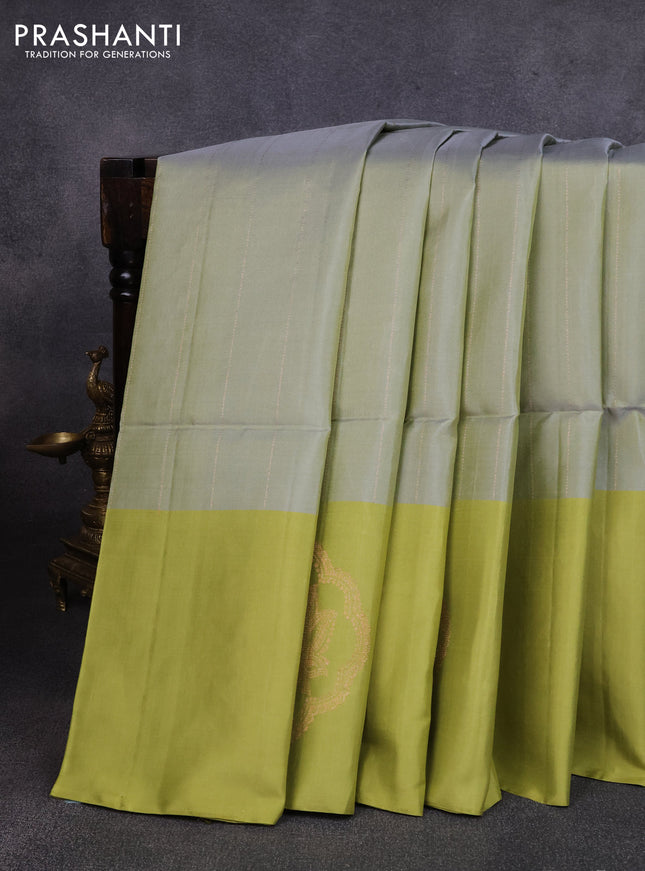 Pure soft silk saree pastel green and light green with allover zari stripe pattern and zari woven butta border