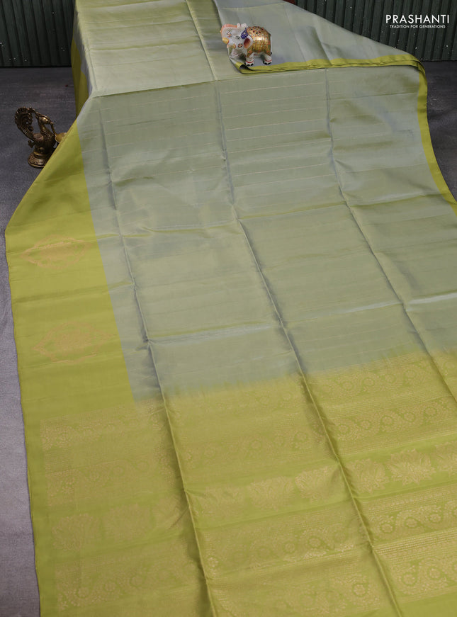 Pure soft silk saree pastel green and light green with allover zari stripe pattern and zari woven butta border