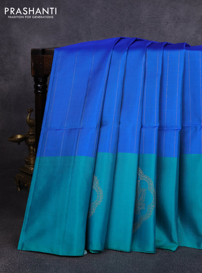 Pure soft silk saree dual shade of blue and teal green with allover zari stripe pattern and zari woven butta border