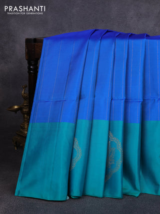 Pure soft silk saree dual shade of blue and teal green with allover zari stripe pattern and zari woven butta border