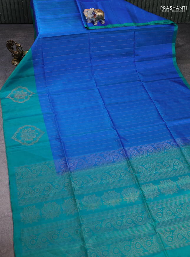Pure soft silk saree dual shade of blue and teal green with allover zari stripe pattern and zari woven butta border