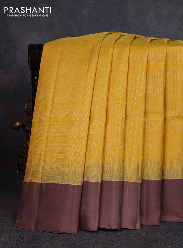 Pure soft silk saree yellow and pastel brown with allover zari woven brocade weaves and simple border