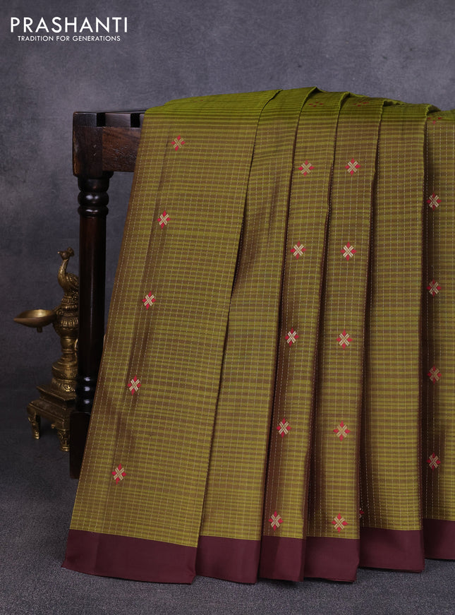 Pure soft silk saree sap green and coffee brown with allover zari weaves & buttas and simple border
