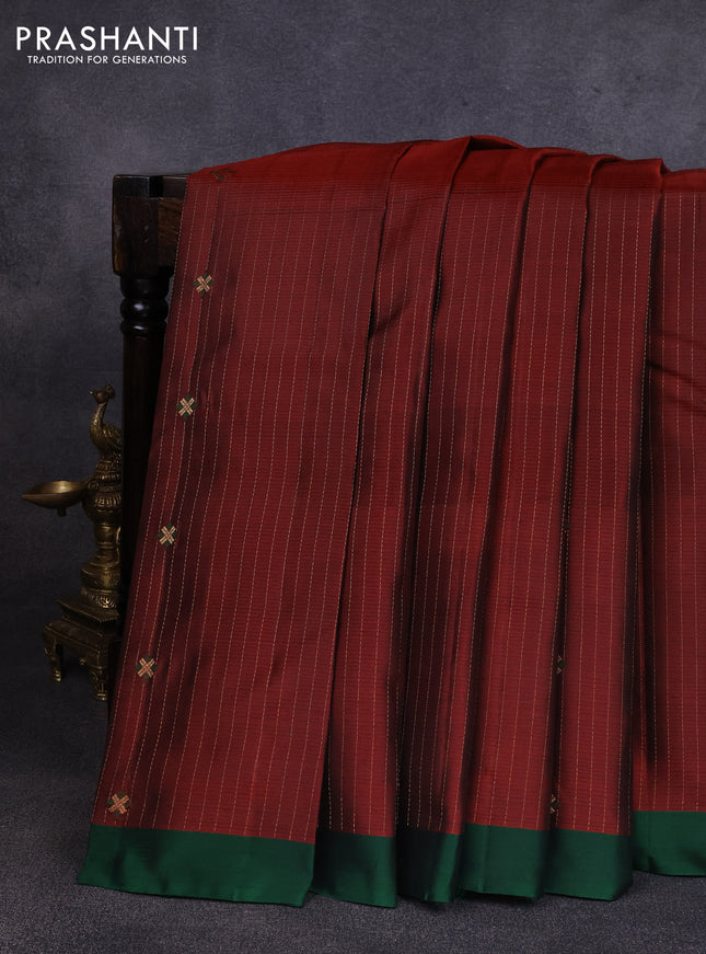 Pure soft silk saree maroon shade and green with allover zari weaves & buttas and simple border